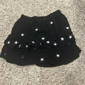 Medium black skirt with stars, Storia, worn frequently, good condition